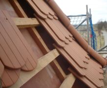 roof during fitting of new roof tiles